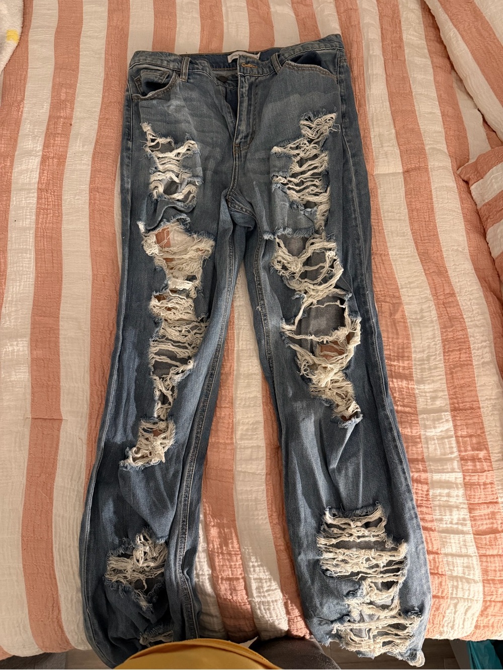 Distressed Light Blue Women’s Ripped Jeans